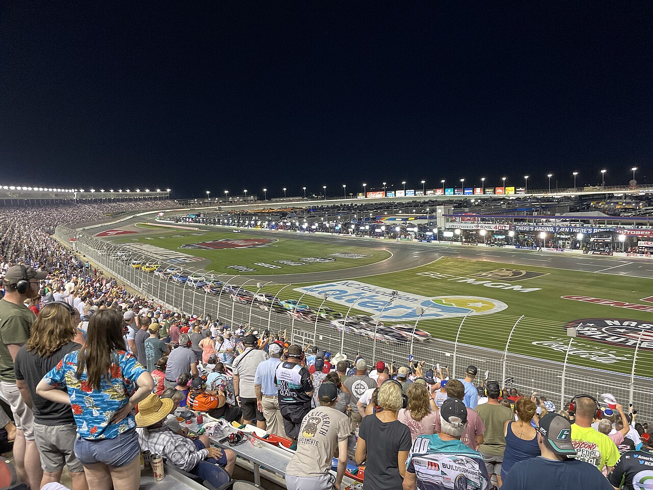 Charlotte Motor Speedway Kart Track — The 2024 Coca-Cola 600 at Charlotte Motor Speedway viewed from the frontstretch. Christopher Bell (#20) leads the field at the beginning of 
