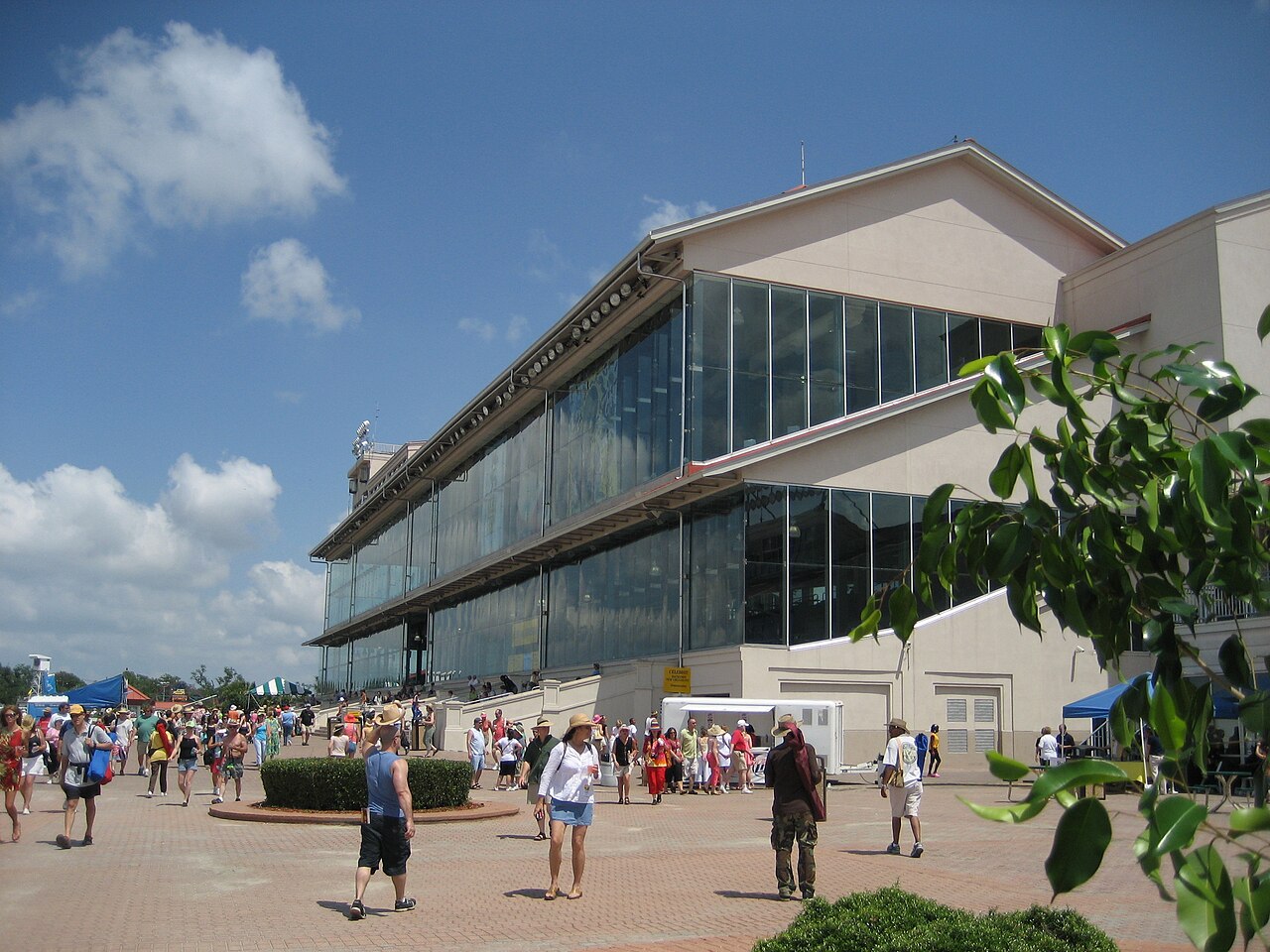 Fair Grounds Race Course & Slots — New Orleans Jazz &amp; Heritage Festival: View to Fairgrounds grandstands main building.