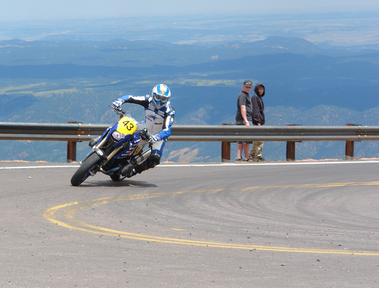 Pikes Peak International Hill Climb — A motorcycle leaning in a turn. Taken at the end of the pavement at the 2007 Pike Peak International Hillclimb.
